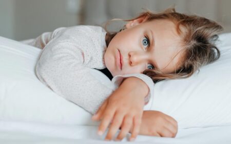 child in bed