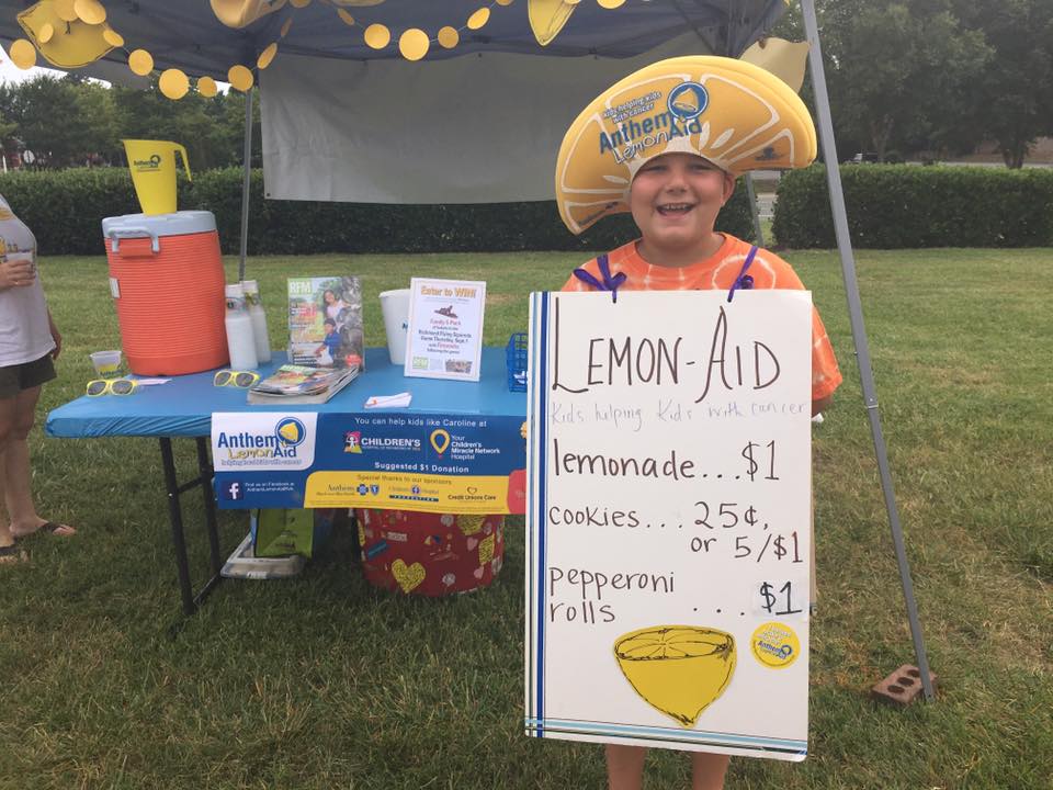 boy at Anthem LemonAid stand 