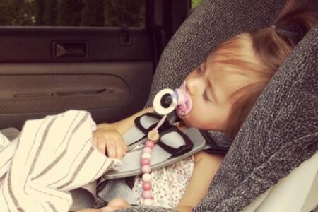 toddler sleeping in car seat