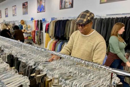 man shopping at Goodwill store