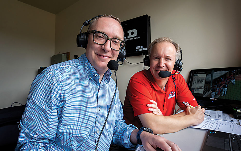 President Kevin Hallock and UR Chaplin Craig Kocher in the announcer's booth.