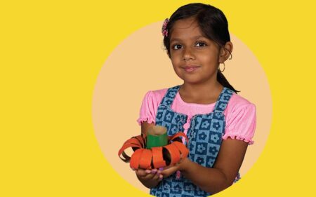 girl with pumpkin craft