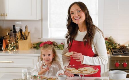 Brittany Mullins cooking with daughter