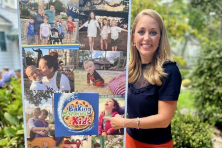 Sarah Bloom with Baking Memories 4 Kids sign