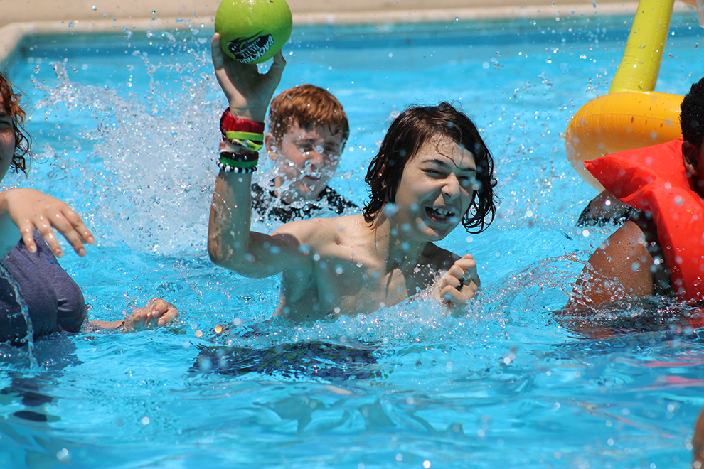 SOAR365_Summer_Camp_ kids with disabilities playing in pool