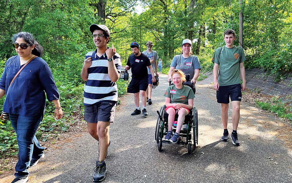 Janie and friends walking in woods