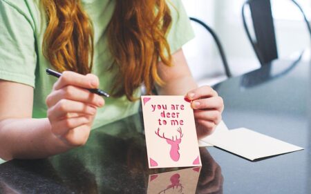 Child writing thank you note