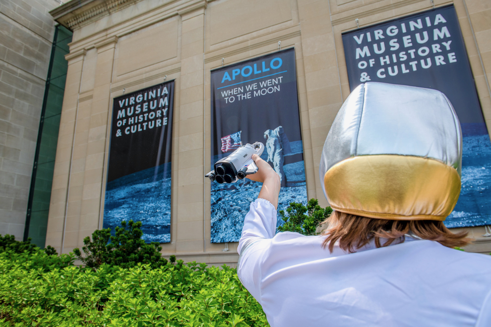 Child on the front lawn of VMHC in space-themed gear