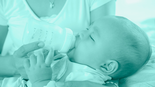 Baby drinking from a bottle