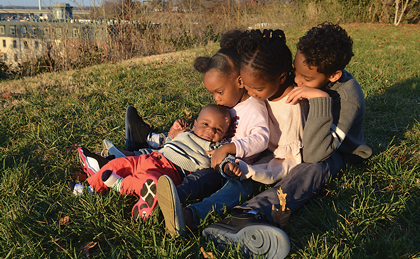 Black children in a family portrait