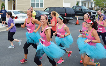 Kelly leading a team of runners to support ReeseStrong in its mission to help local families affected by childhood cancer. 