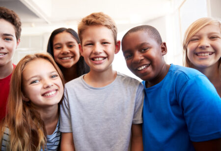 Male And Female Students Kids In Grade School Classroom