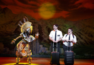 THE BOOK OF MORMON: Monica L. Patton, Ryan Bondy, Cody Jamison Strand – Photo by Joan Marcus CODY JAMISON STRAND (ELDER CUNNINGHAM) CANDACE QUARRELS (NABULUNGI)