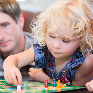 Child playing board game