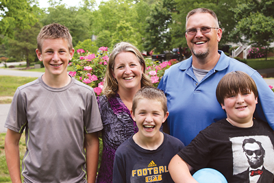 Anna Beth and Ed Kozusko of Midlothian conduct regular budget discussions around the dinner table to help their boys understand the importance of balancing expenses.