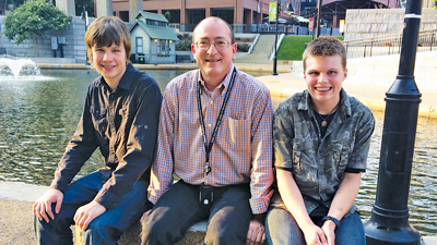 Steven Effinger with Richard and Jeffery at the Canal Walk on the day the adoption was finalized.