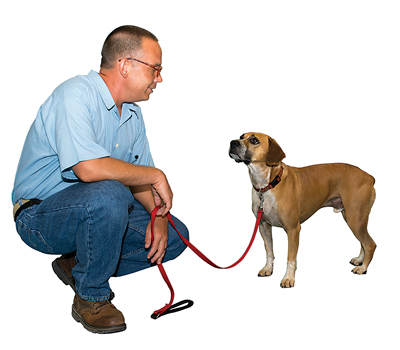 Jon Ganz, shown with Timber, has trained about fifteen dogs through the program.