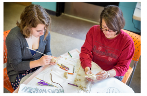 At a workshop in advance of How to Make a Monster, families sketched their own  monsters then crafted them in clay.